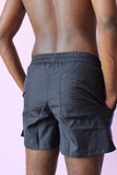JW ANDERSON STUDS SWIM SHORTS