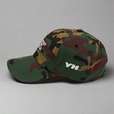 Protect the Dolls Dad Hat by YES HOMO in Green Camo
