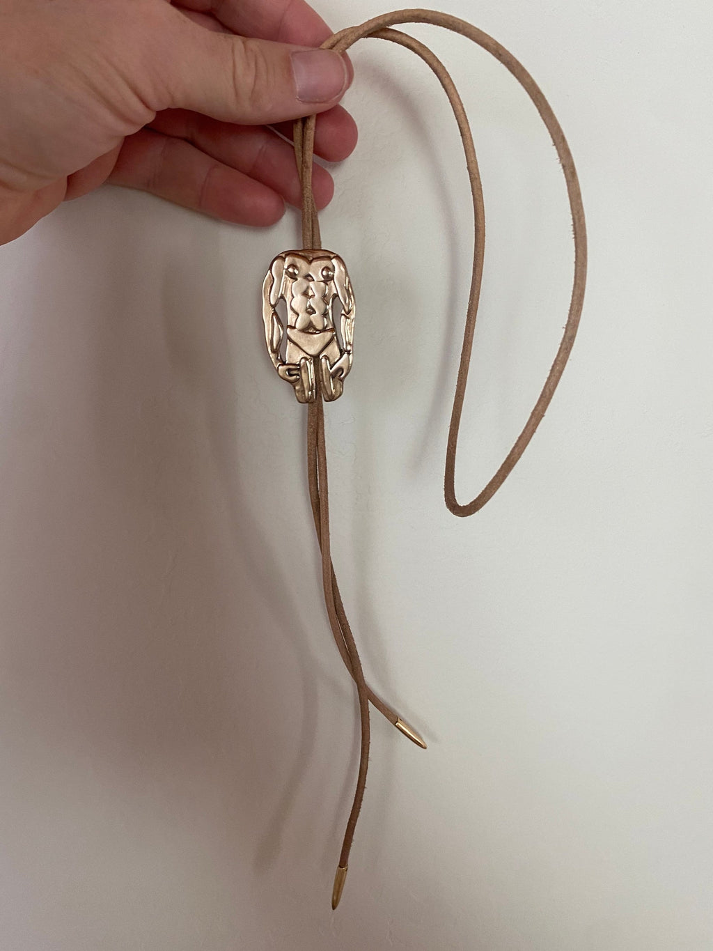 Bronze Muscular body bolo tie by Gilty Boy