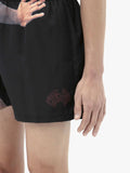 JW ANDERSON STUDS SWIM SHORTS