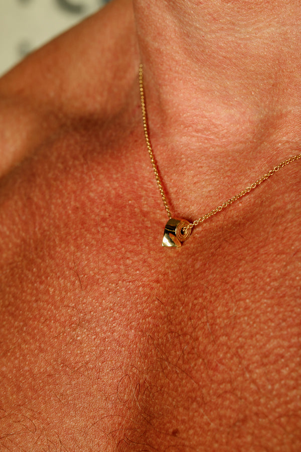 TOILET PAPER NECKLACE by Jonathan Johnson