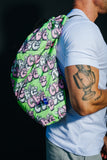 COMME des GARÇONS SHIRT x KAWS Drawstring Bag (Green/Pink)