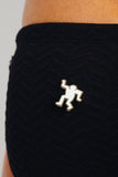 KEITH HARING DANCING MAN PIN - WHITE