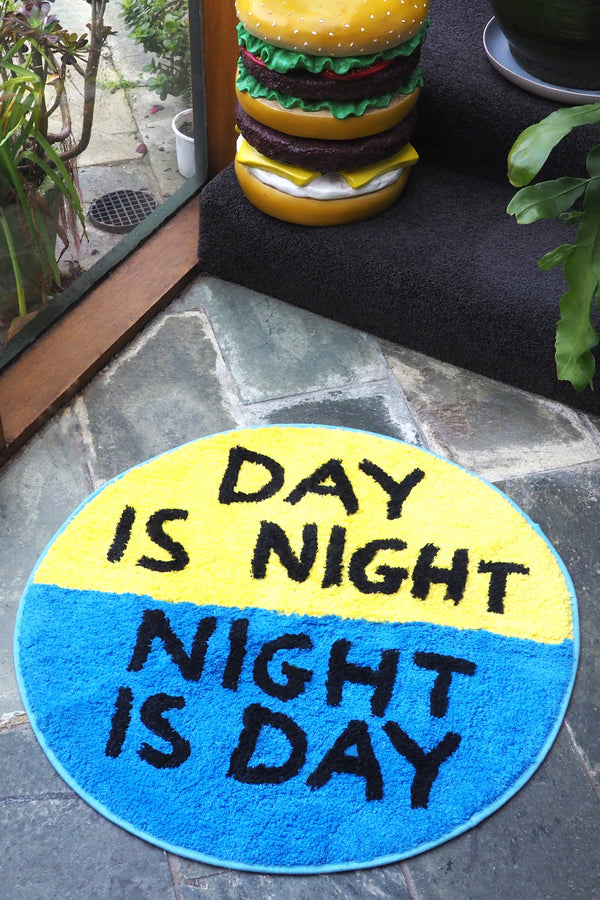 Day is Night / Night is Day Shaggy Floor Mat - Third Drawer Down X David Shrigley