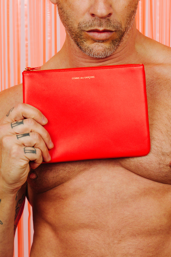 COMME DES GARÇONS CLASSIC POUCH orange